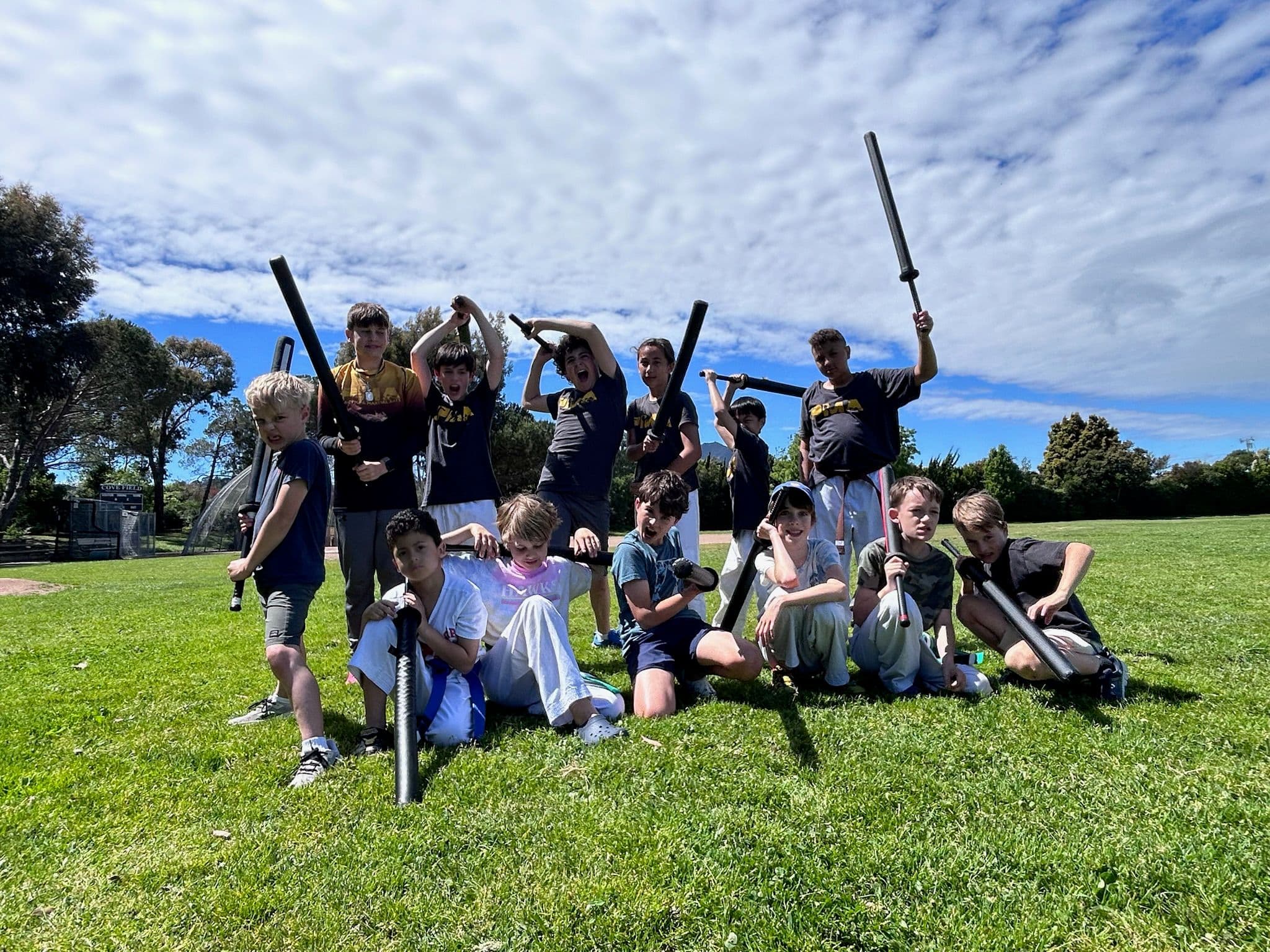 PMA Ninja Camp group with padded swords on the field