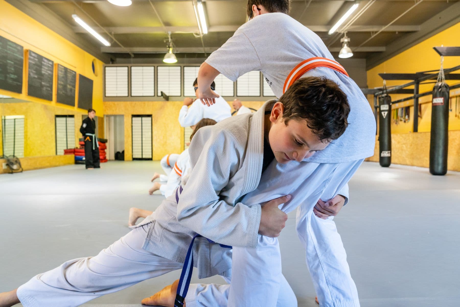 Students drilling a takedown